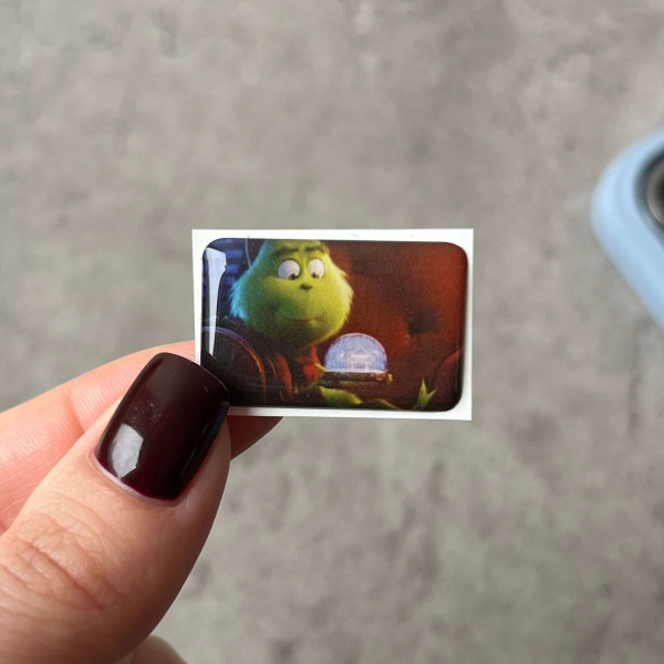 3D стікер "Little Grinch and a Christmas bauble"